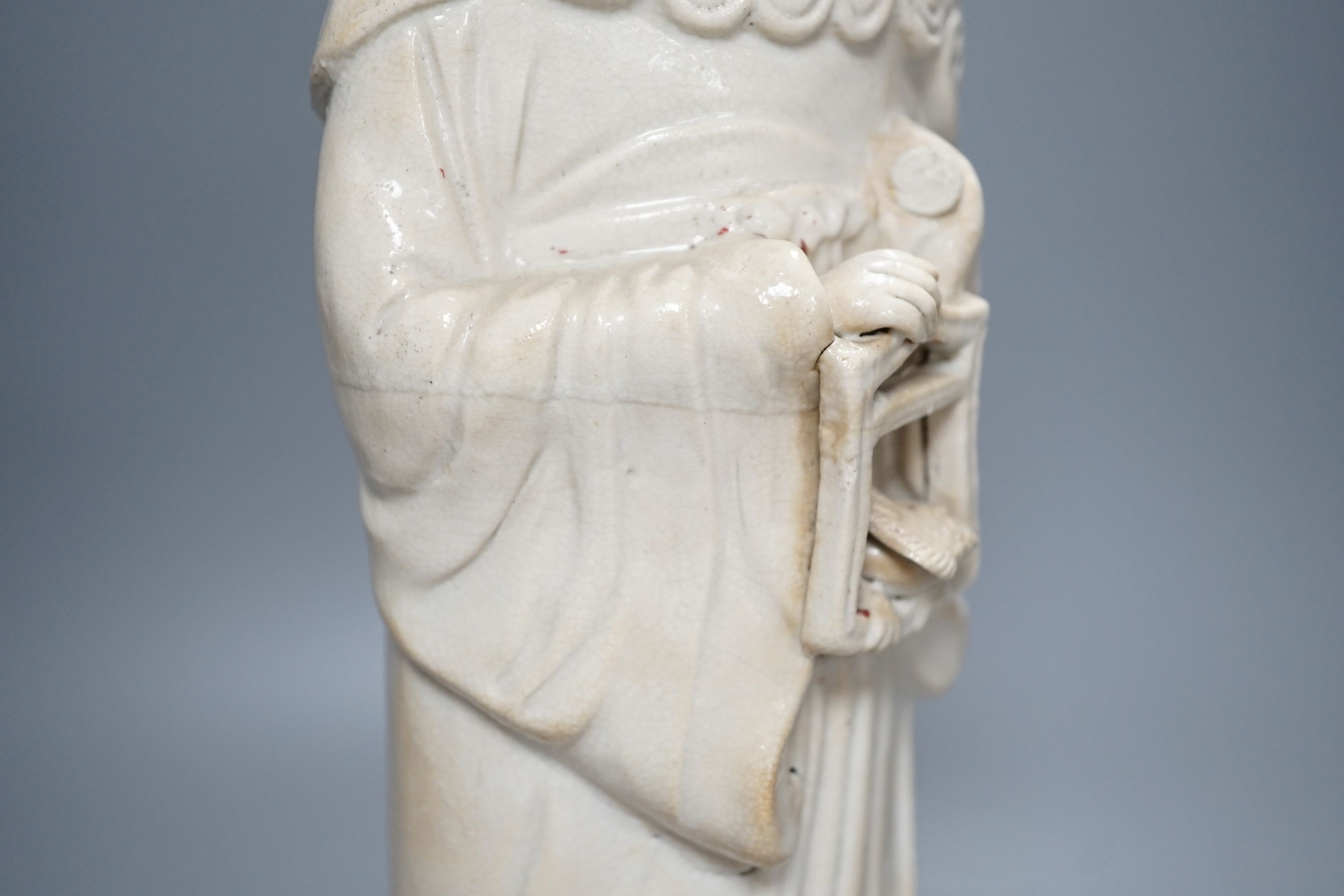 A Chinese blanc de chin figure of a lady with a bird, 37cm, together with a famille rose teapot, a yixing style teapot, blue and white jar and cover and a pale celadon ground ‘ox head’ libation cup